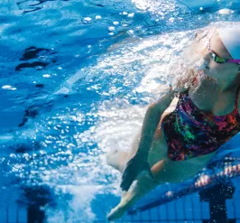 Woman swimming in lap lane