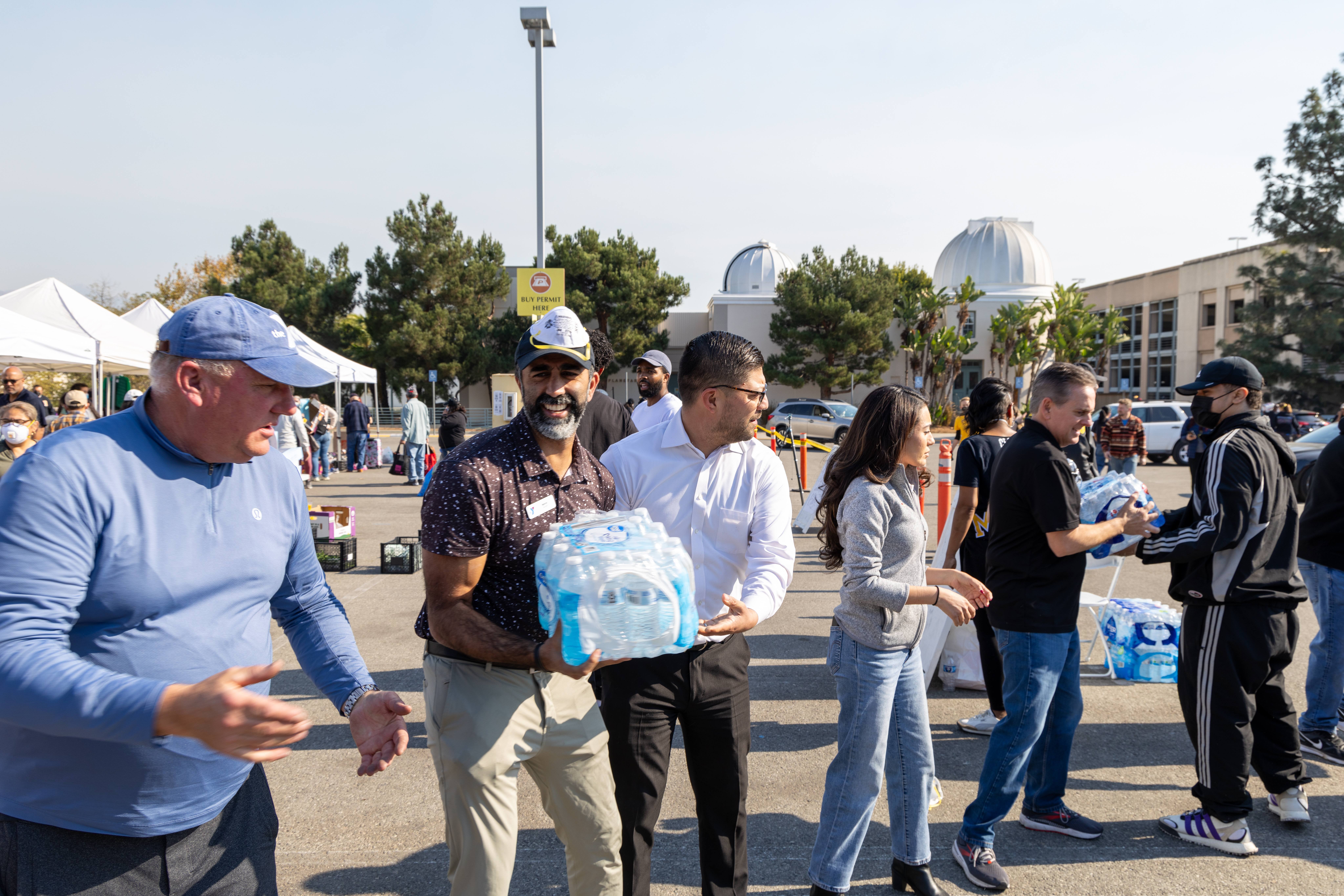 Volunteers passing water
